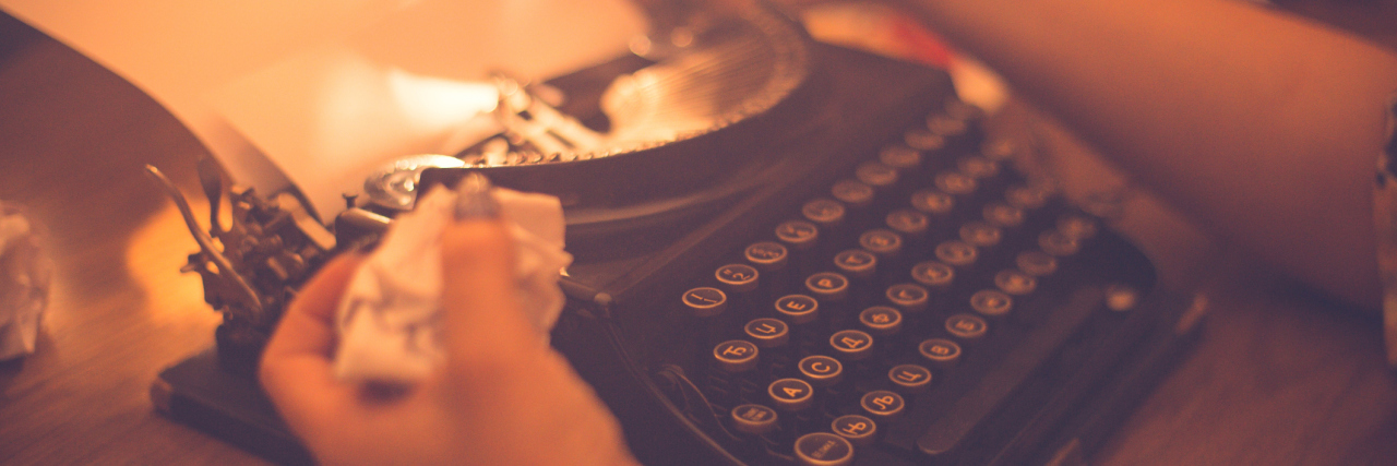 When Lyme Disease Shattered My Vocabulary A woman wadding up paper at her type writer.
