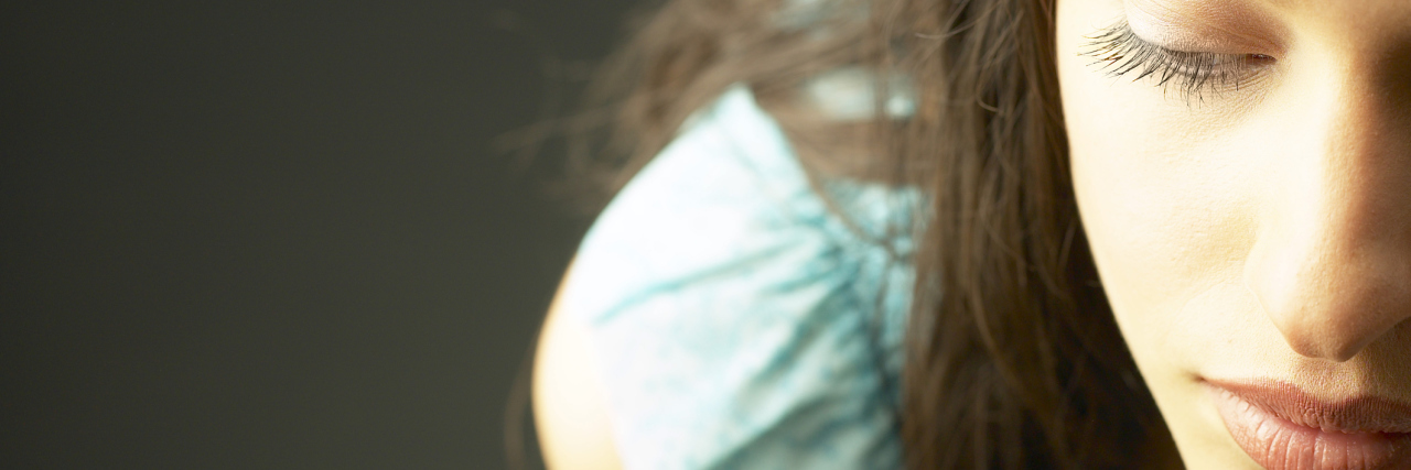 Simple Ways to Practice the Subtle Art of Self-Care young woman close up with eyes closed