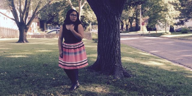 How I'm Learning to Trust My Journey With Rare Disease woman standing under a tree