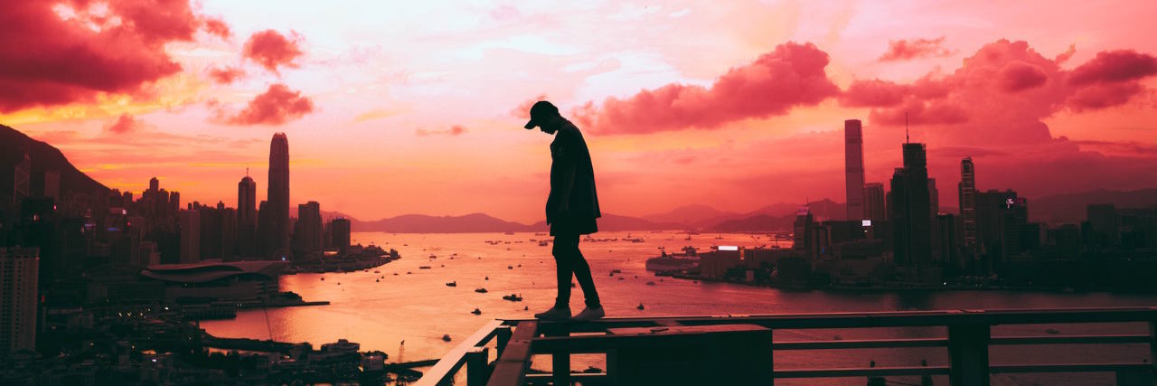 The Nightmares I Have as Someone With Borderline Personality Disorder man on railing