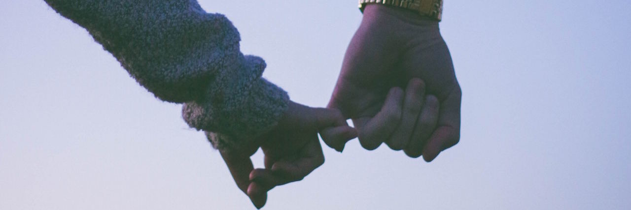 How I Learned to Have Sex After Losing My Virginity to Rape A couple holding hands