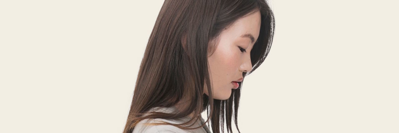 Why I'm Sharing My Story on World Suicide Prevention Day woman sad