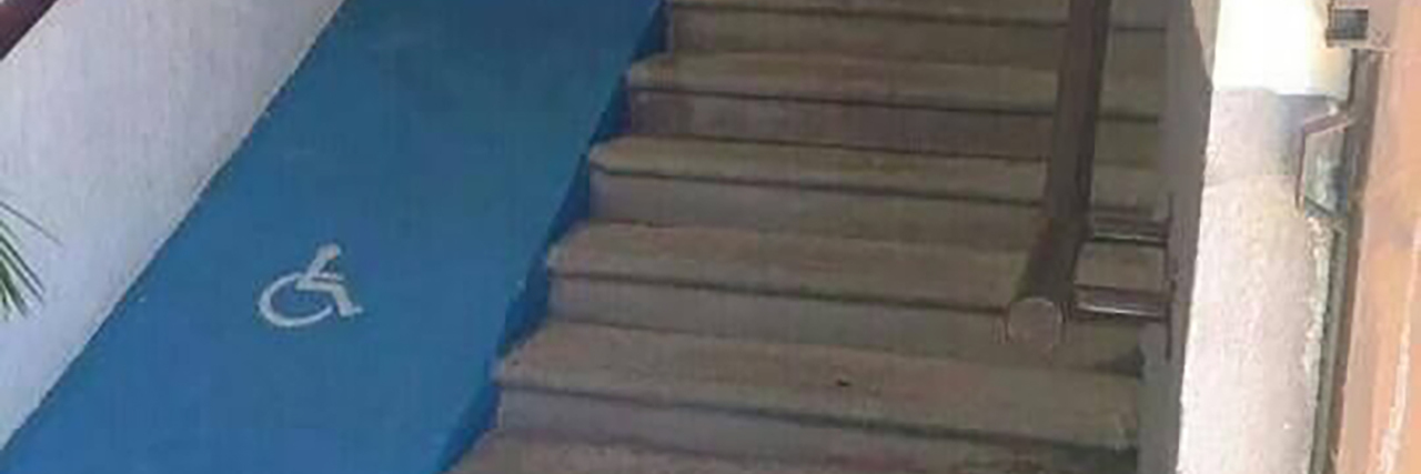Addressing Fake or Inadequate Disability Accessibility Terrible ramp alongside stairs that no one could actually use.