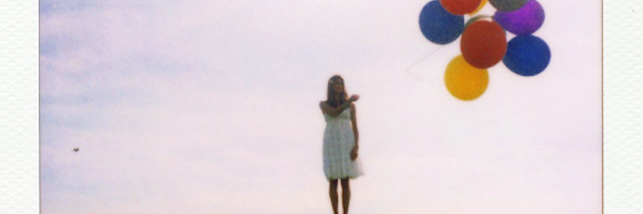 polaroid girl with balloons