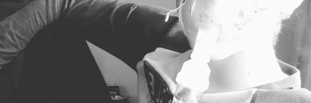 Letter to Doctors From a Chronically Ill Patient black and white photo of person wearing an oxygen mask
