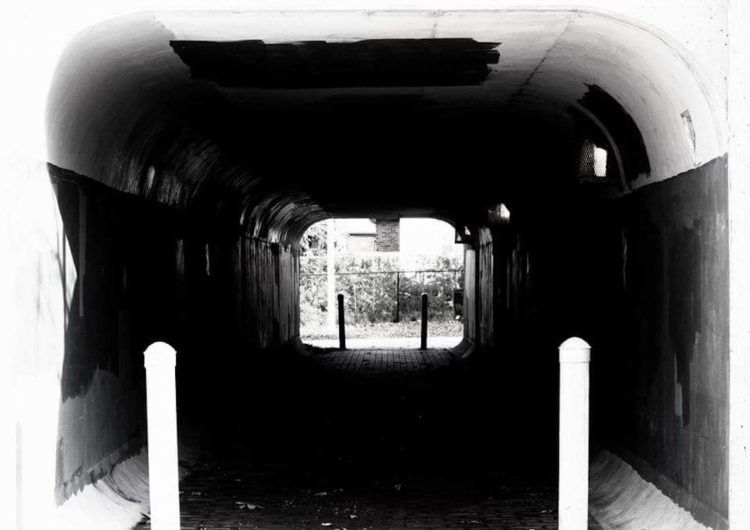 black and white photo of a tunnel by the author