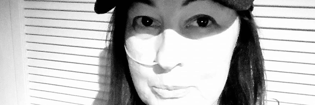 Gastroparesis: When People Stare and Ask Questions About Feeding Tube black and white photo of a woman with a feeding tube in her nose