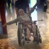 woman sitting in a wheelchair