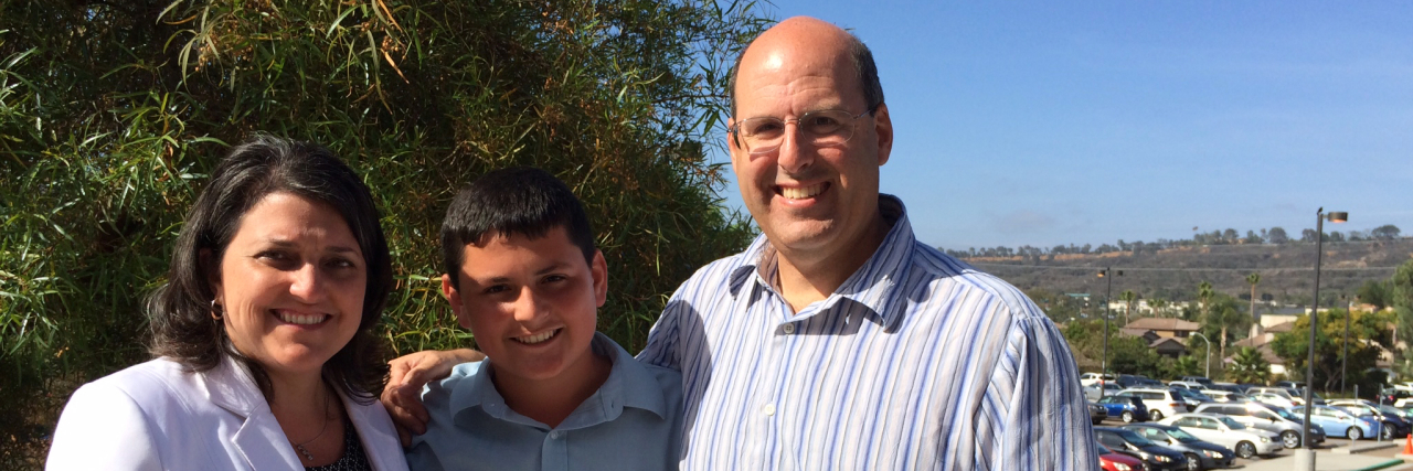 Advice for Parents From a Teen on the Autism Spectrum Ethan with his parents.