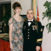 Colleen with her husband Terry in his uniform.