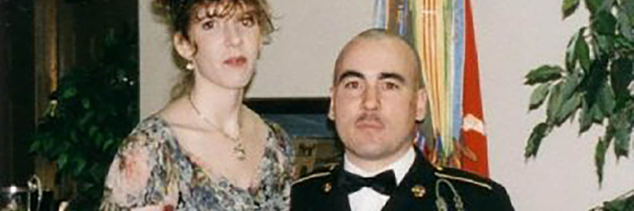The Effect of Traumatic Brain Injury on Military Veterans and Families Colleen with her husband Terry in his uniform.