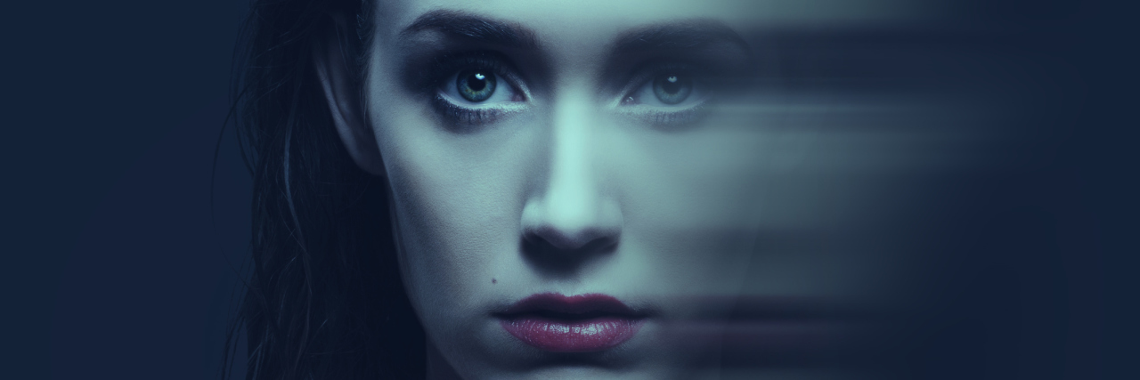 What It's Like to Live With Multiple 'Personalities' Blue toned beauty portrait of young Caucasian woman with wet hair with a motion blur effect