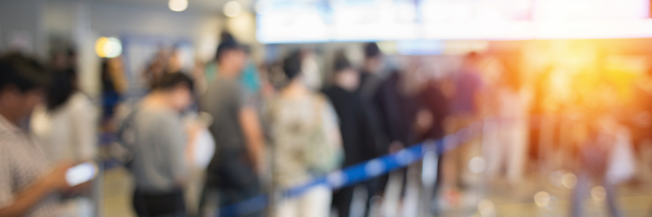 To the Woman Who Helped Me While I Was Having a Meltdown at Airport Blurred background queue.