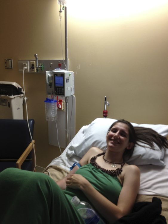 michaela oconnor lying in hospital bed