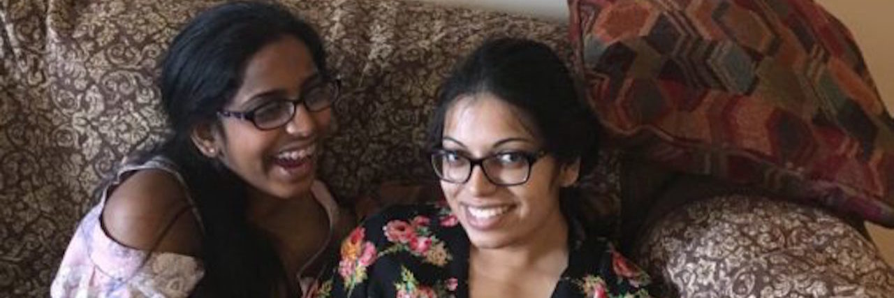 How My CHD Taught Me to Live The writer and her friend sitting on the couch, the day she returned home from the hospital.