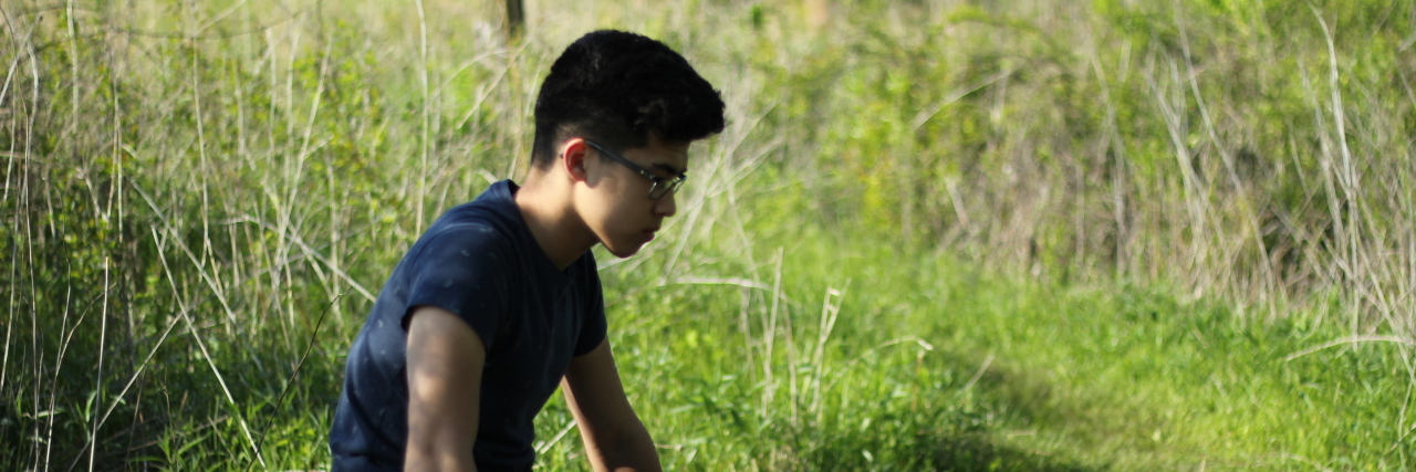 What I Mean When I Say I'm Having a 'Mental Breakdown' man sits on a dock near a pond