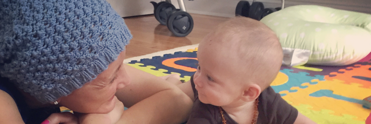 Drugs, Hugs and Losing My Jugs: A Breast Cancer Journal - May 21, 2015 Jessica Sliwerski playing with Penelope on playmat