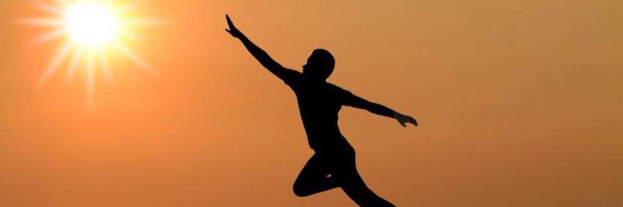 How Faith Helps in Life With Gastroparesis man jumping between cliffs in a 'leap of faith'