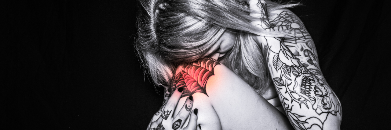 Overcoming the Grief of My Rheumatoid Arthritis Diagnosis photo of woman with tattoos