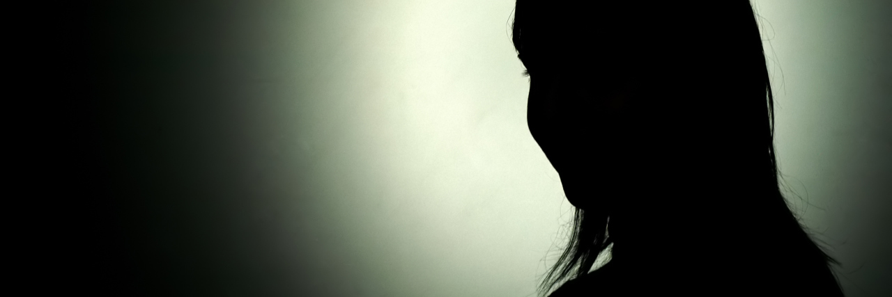 When Lyme Disease Causes Post-Traumatic Stress Disorder (PTSD) silhouette of a woman