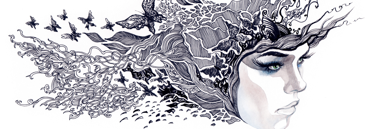 I Still Haven't Been Diagnosed for My Mental Illness beautiful womans face with decorated hair in the wind