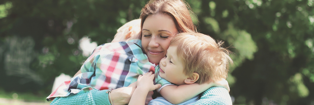 Telling Your Children You Have Epilepsy and Seizures mother hugging her two sons