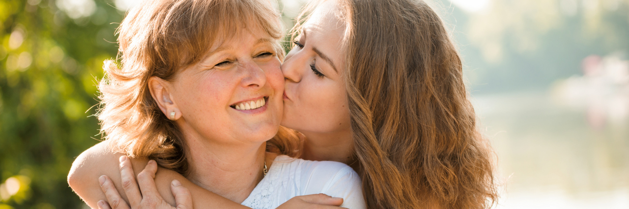 Lyme Disease: How to Support a Family Member With Chronic Illness daughter hugging her mother
