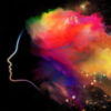 abstract outline of woman's head with colorful clouds around it