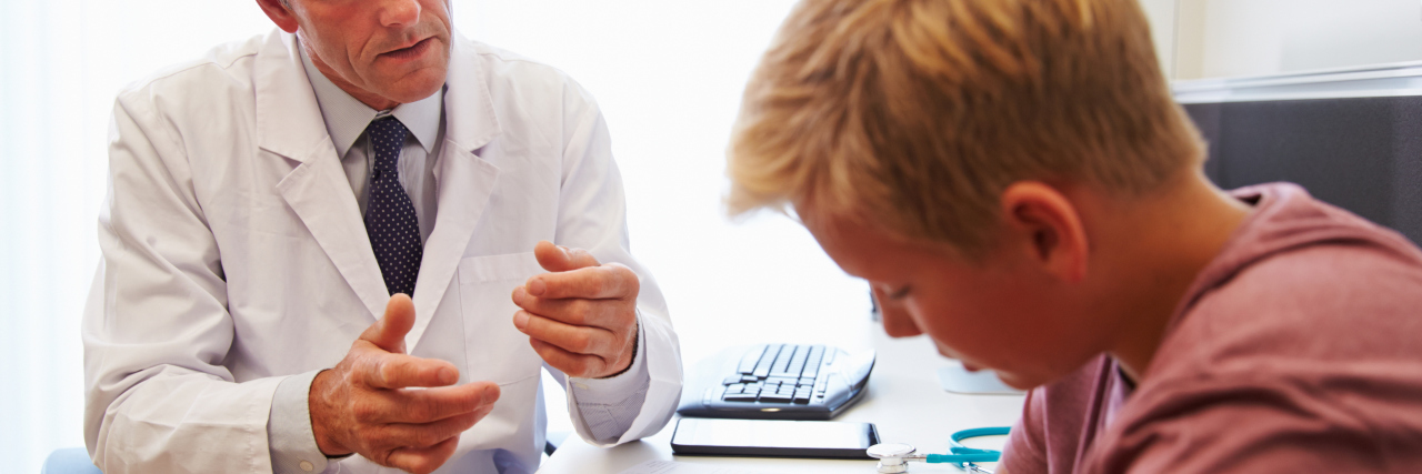 From a Childhood Parkinson's Disease Diagnosis to a Life of Advocacy Doctor talking to boy.