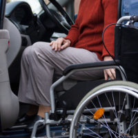 Wheelchair user getting ready to drive.