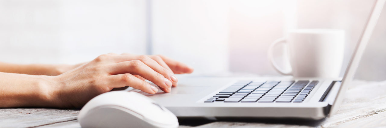 This is the Reality of Breast Cancer, and Those Google Search Results Close-up of female hands on laptop keyboard