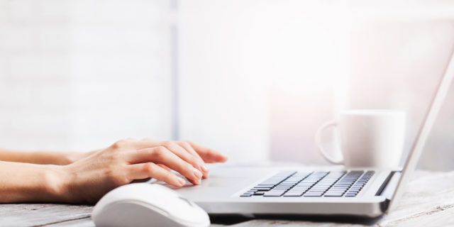 This is the Reality of Breast Cancer, and Those Google Search Results Close-up of female hands on laptop keyboard
