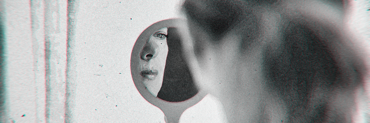 How Losing My Eyesight Changed My Perspective on Appearances Woman looking into a mirror, blurred black-and-white image.