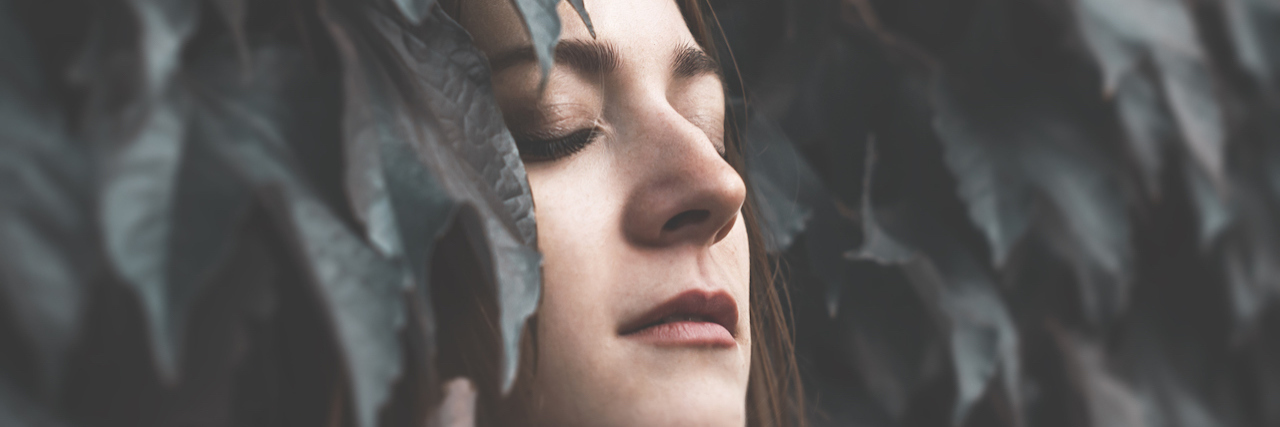 What It Feels Like to Get a PTSD Diagnosis young young surrounded by leaves