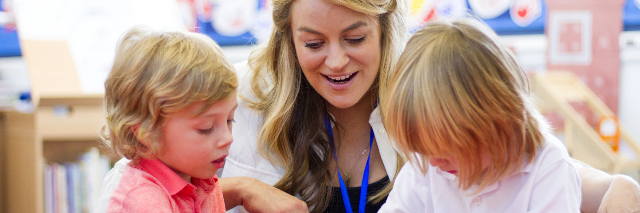 Kindergarten Lessons That Can Be Applied to Chronic Illness woman teaching kindergarten students