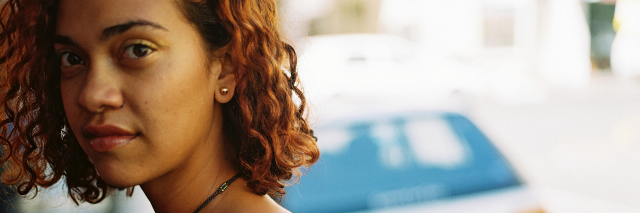 To My Friend Who Can't See Past My Depression A woman smiling