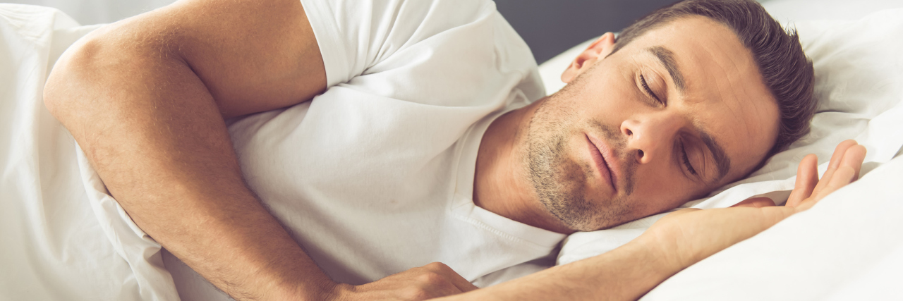 What I Dream About as Someone With Multiple Sclerosis man sleeping in bed