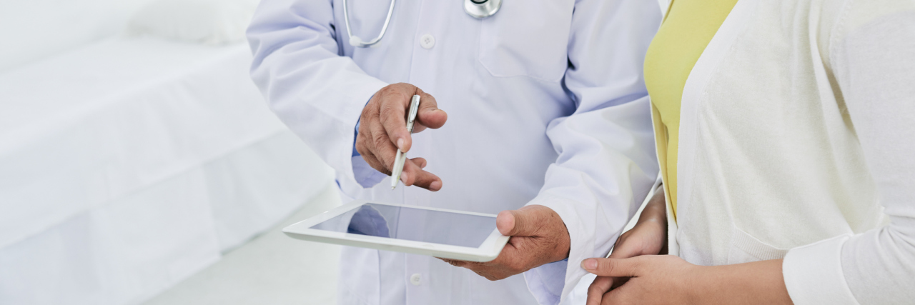 patient talking to doctor