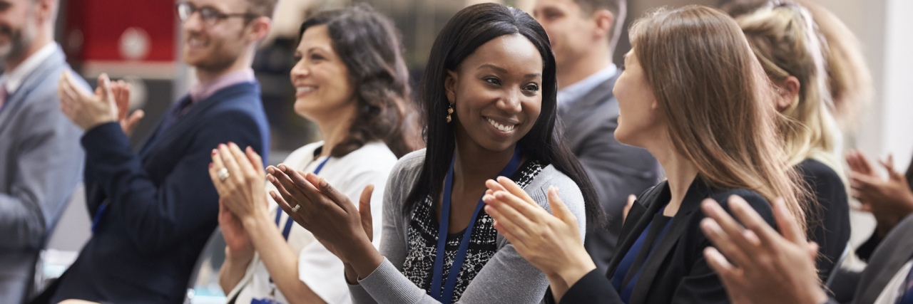 The First Time I Met Other People Who Stutter Audience applauding during meeting