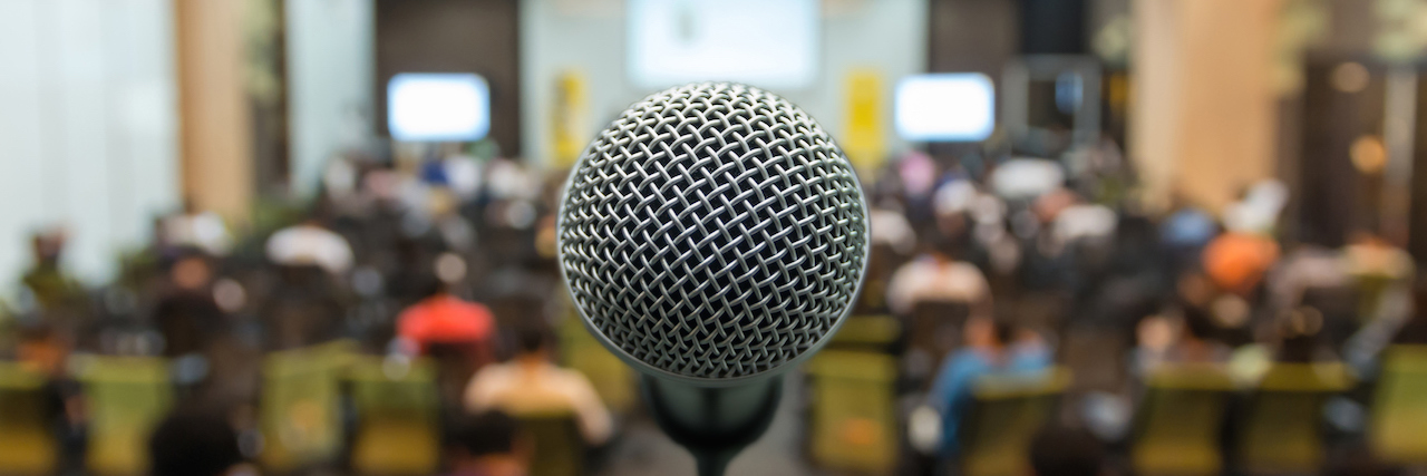 microphone in front of an crowd