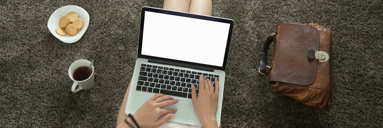 Why Posting 'Me Too' Made Me Feel Even More Alone Woman on computer