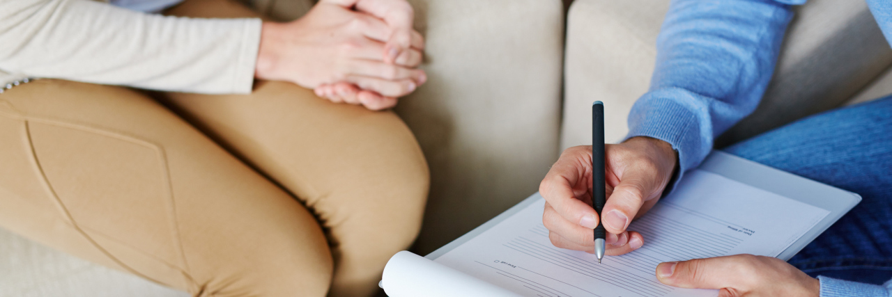 When Mental Health Professionals Make You Feel Worse Male psychologist wiriting down story of his patient