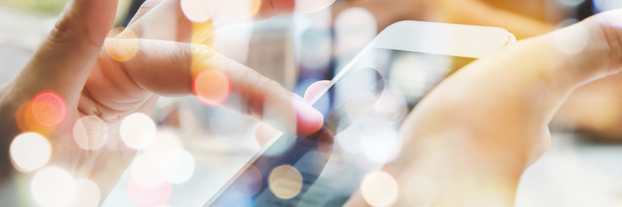 Being Apart of Facebook Support Groups With Ehlers-Danlos Syndrome woman texting on her cell phone