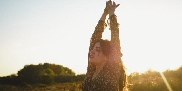 Thyroid Cancer Turned Me Into the 'Free Spirit' I Never Knew I Needed to Be Young beautiful woman enjoying day in nature