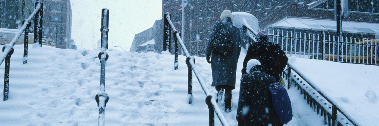 When Winter Worsens Your Rheumatoid Arthritis and Depression people walking up steps outside in the snow