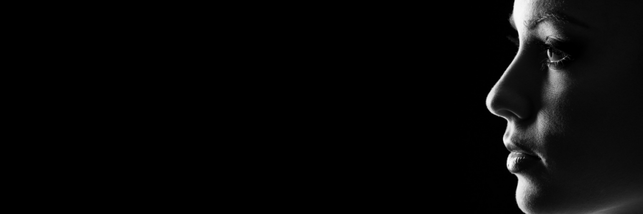 Differences in How Women Experience Pain Due to Past Trauma silhouette of a woman's face