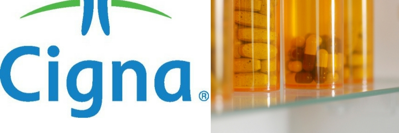 Cigna Will Stop Covering OxyContin Prescriptions cigna logo and bottles of pills