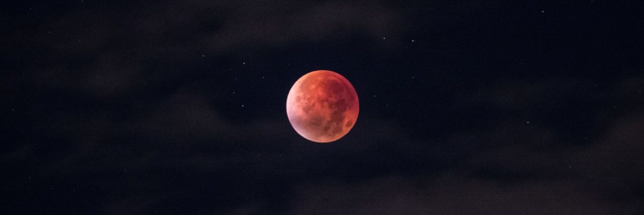 Using the Moon Analogy to Explain My Bipolar Disorder red moon with clouds and stars