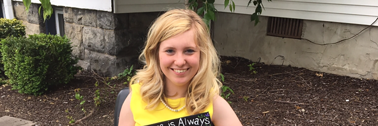 Responding to 'What Happened to You?' as a Person With a Disability Madison Conway sitting outside.