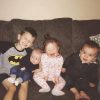 Four siblings, the little girl has Down syndrome